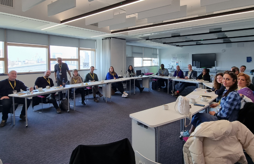 a group of staff from different further education colleges attending London South Bank Technical College for a meeting about the us of AI in further education